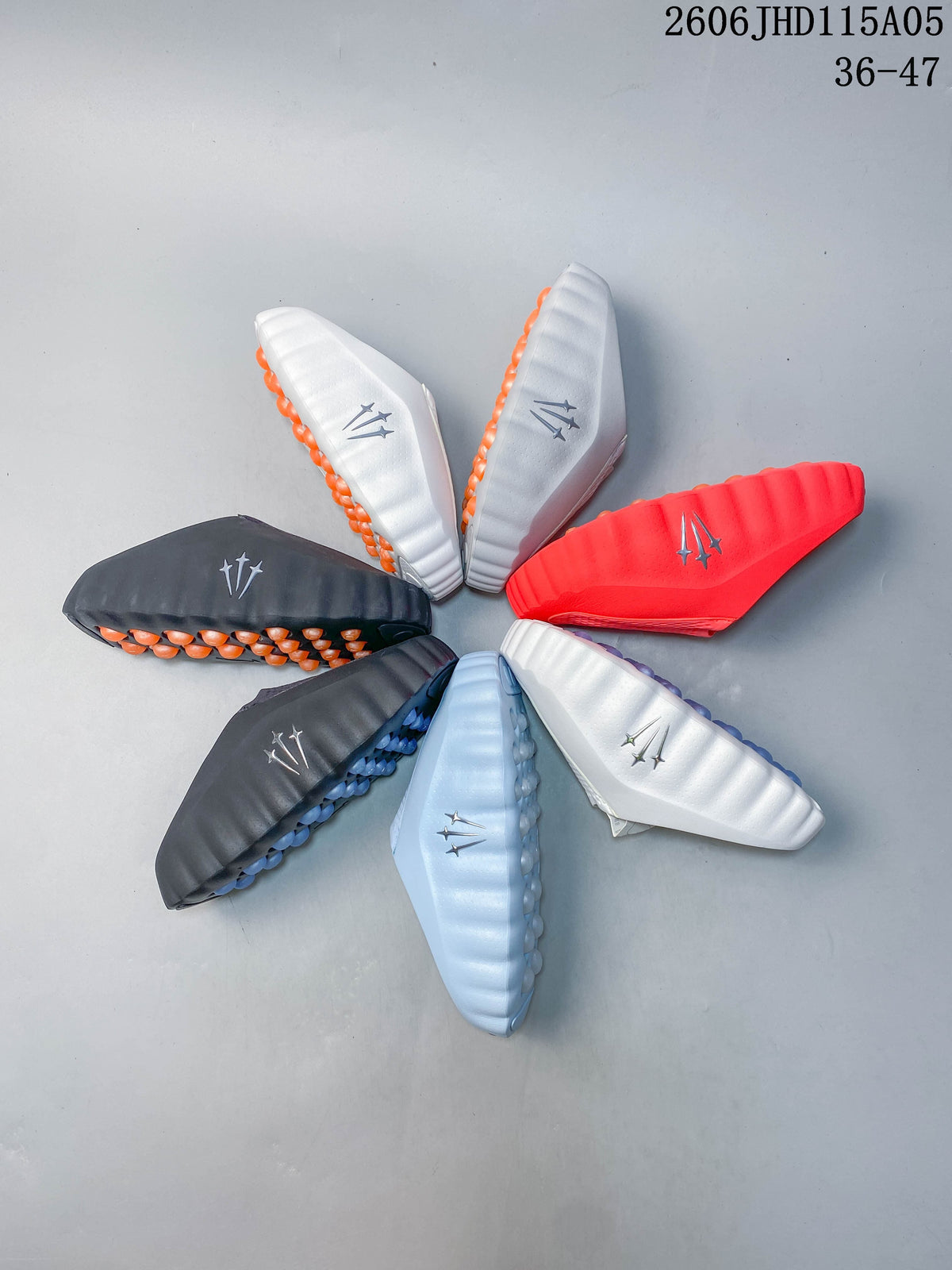 Several Nike Mind slides shown sole-up in different colors