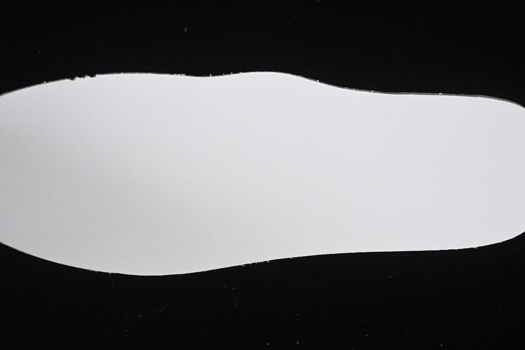 Plain white insole viewed from above