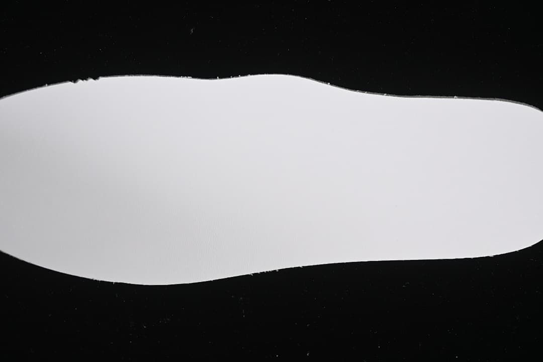 Plain white insole viewed from above