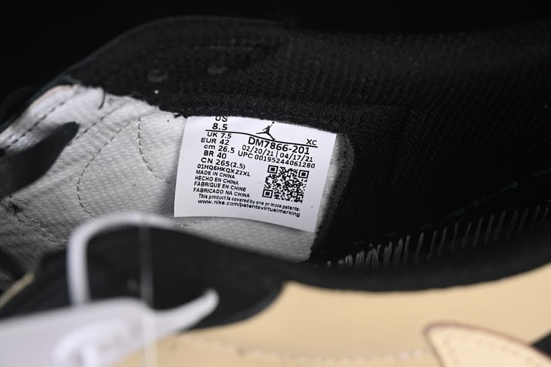 Inside size label showing EU 42 and style code DM7866-201