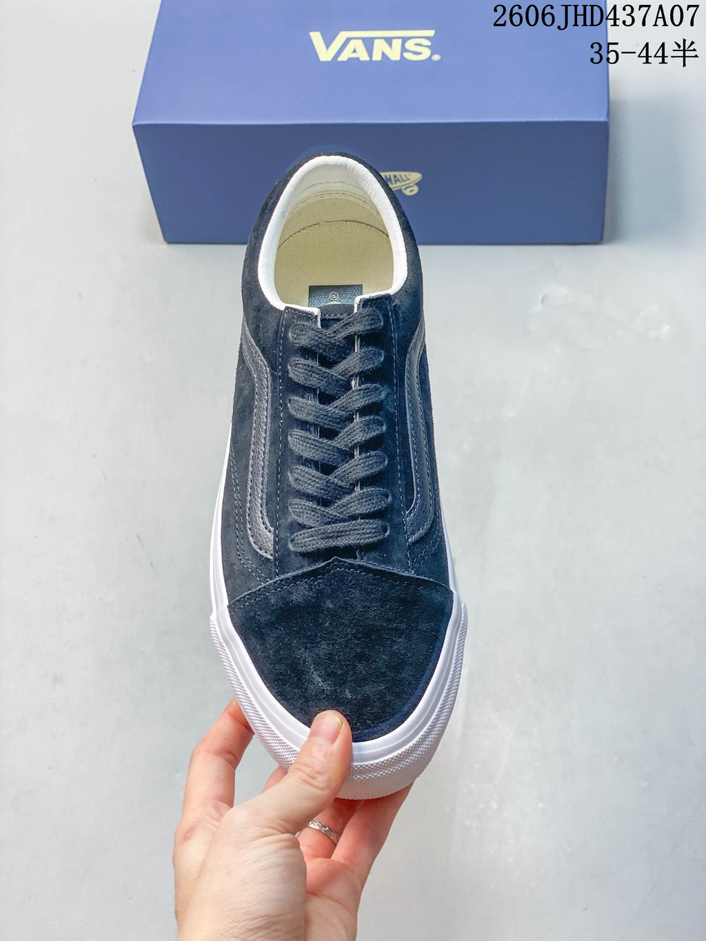 Front view of a navy Vans Old Skool 36 lace-up sneaker