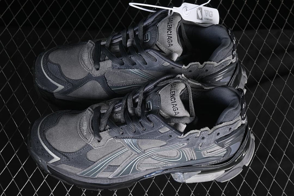 Pair of grey Runner-style sneakers shown from above