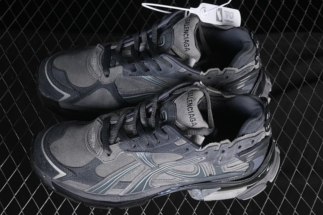 Pair of grey Runner-style sneakers shown from above