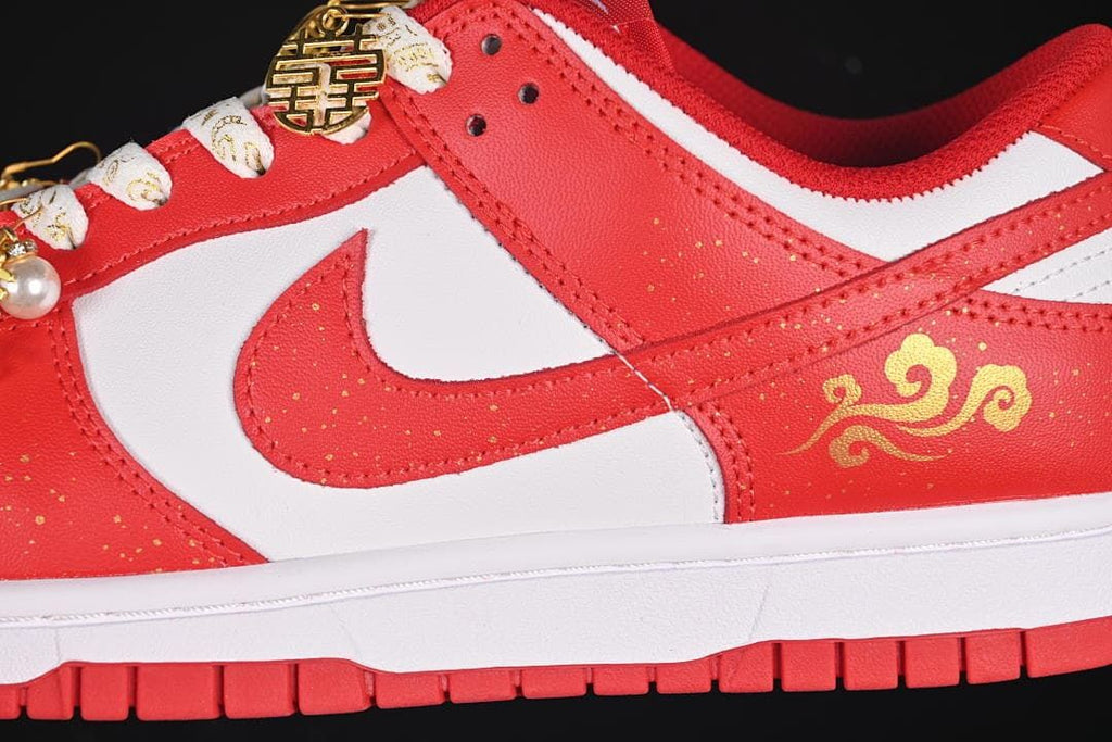 Close-up of the side panel, gold cloud motif, and patterned laces