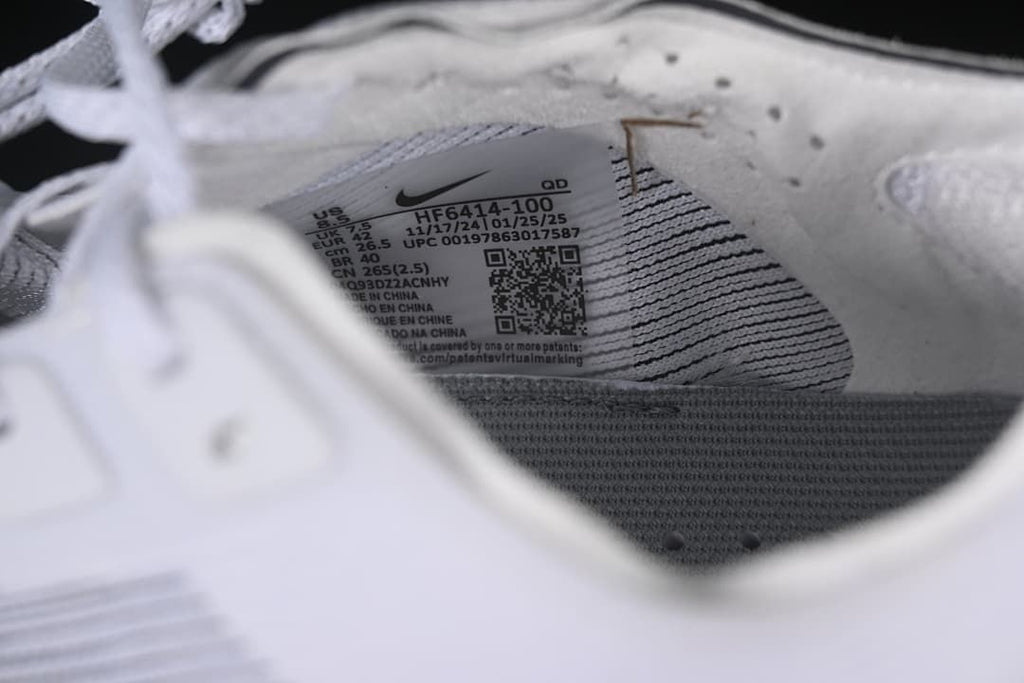 Close-up of the shoe size label showing style code HF6414-100 and a sample size.