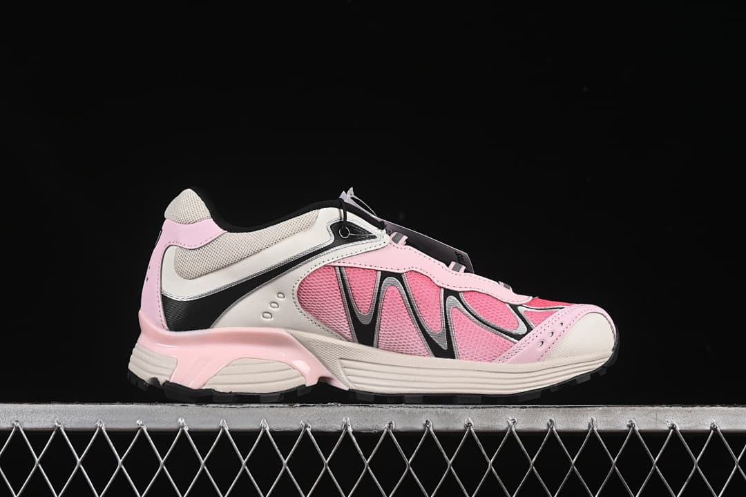 Side profile showing the layered pink, off-white, and black upper