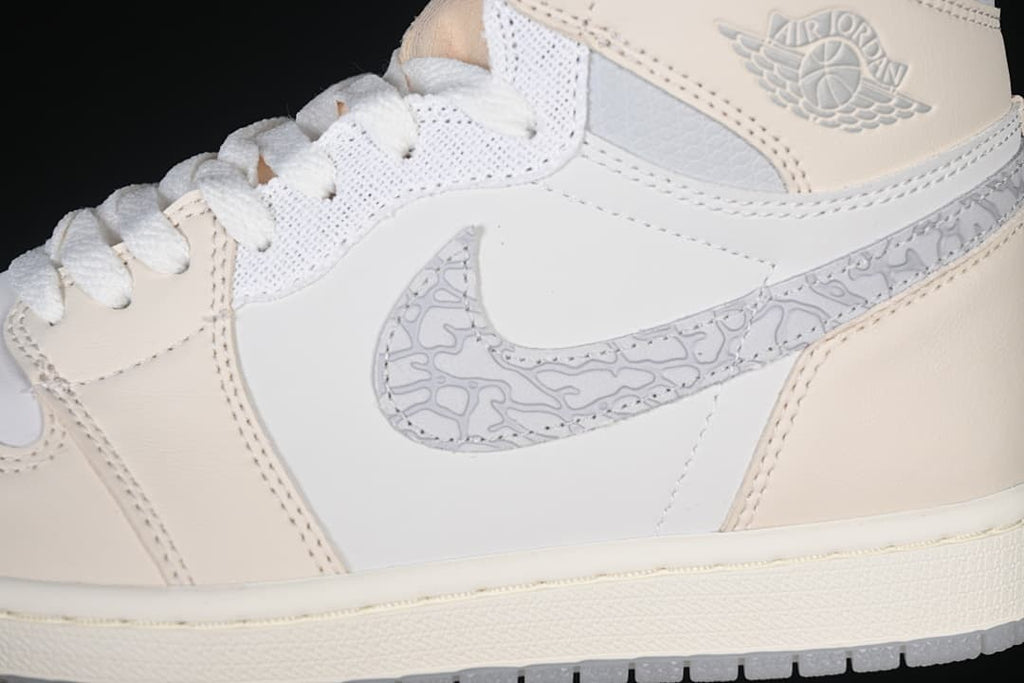 Close-up of the patterned Swoosh and ankle Wings detail