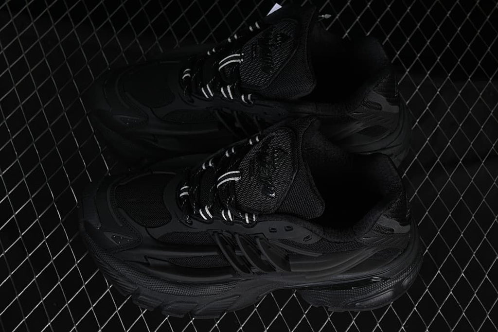 Pair of black Adistar Jellyfish sneakers shown from above.