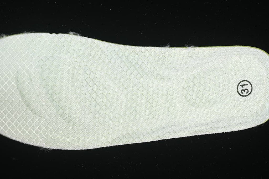Light-colored shoe insole with a visible size marking.