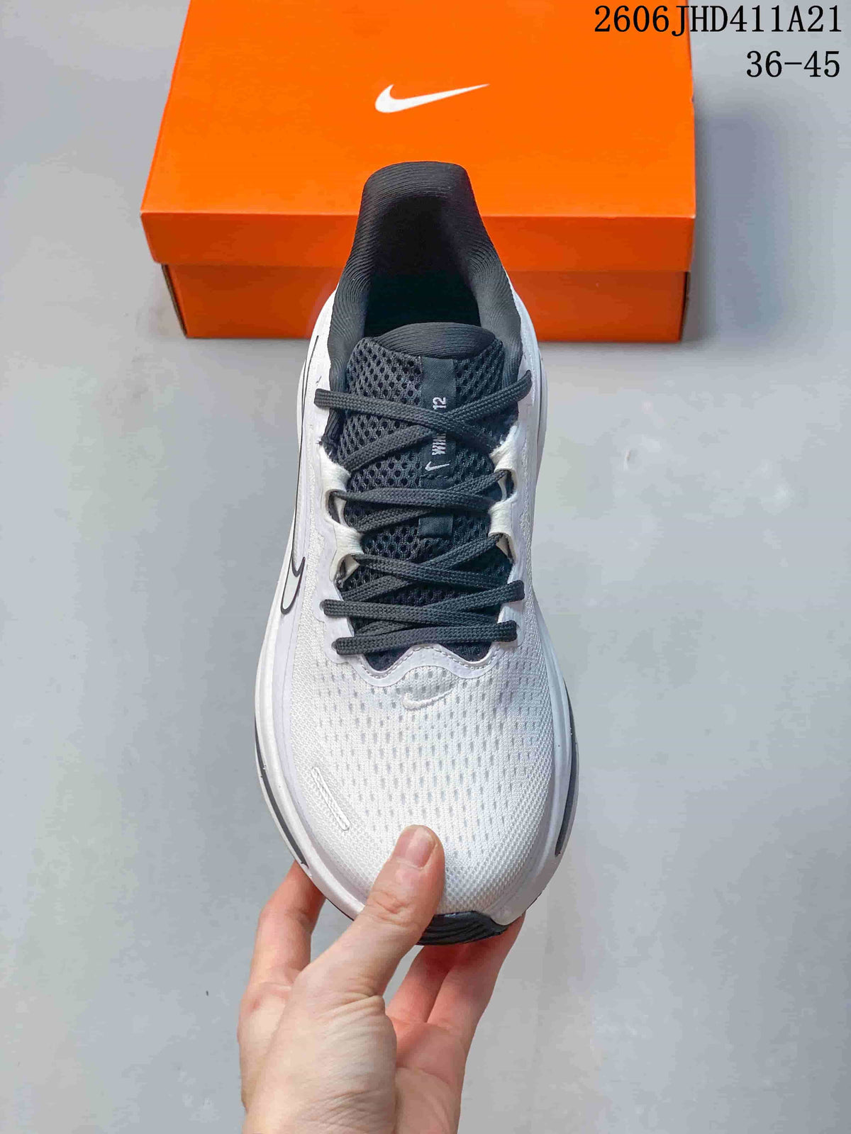 Top view of a Nike Air Zoom Winflo 12 shoe with dark laces and mesh-look upper