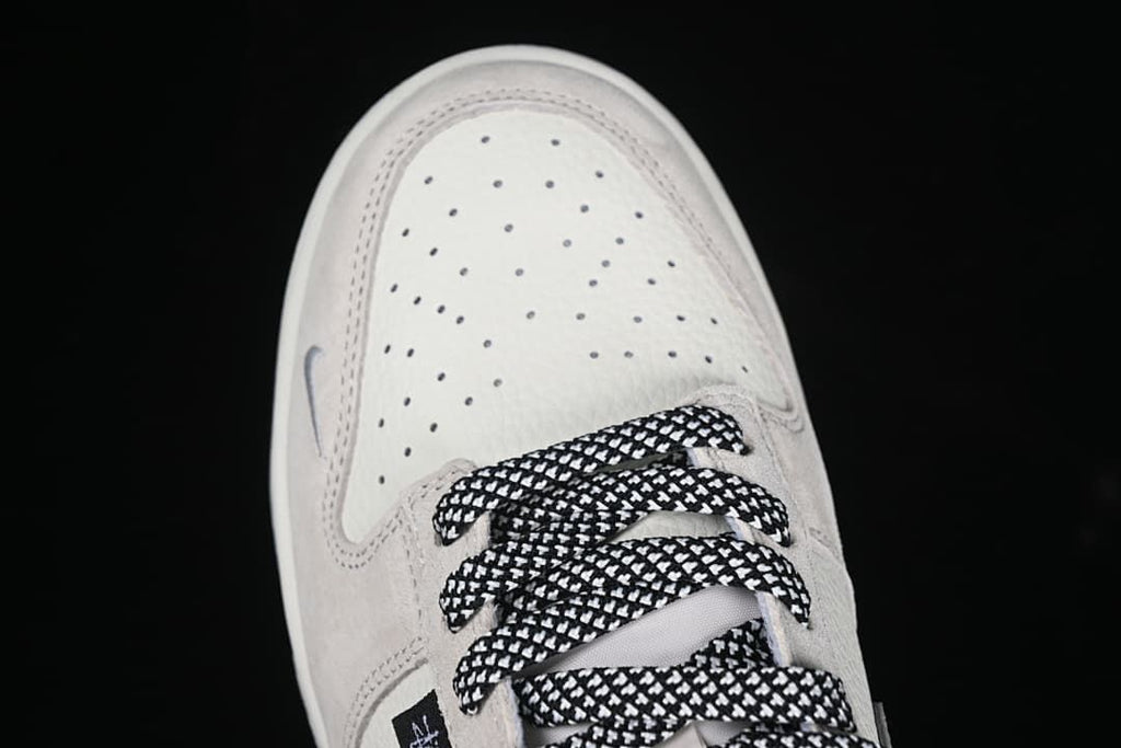 Top view of the perforated toe and patterned laces