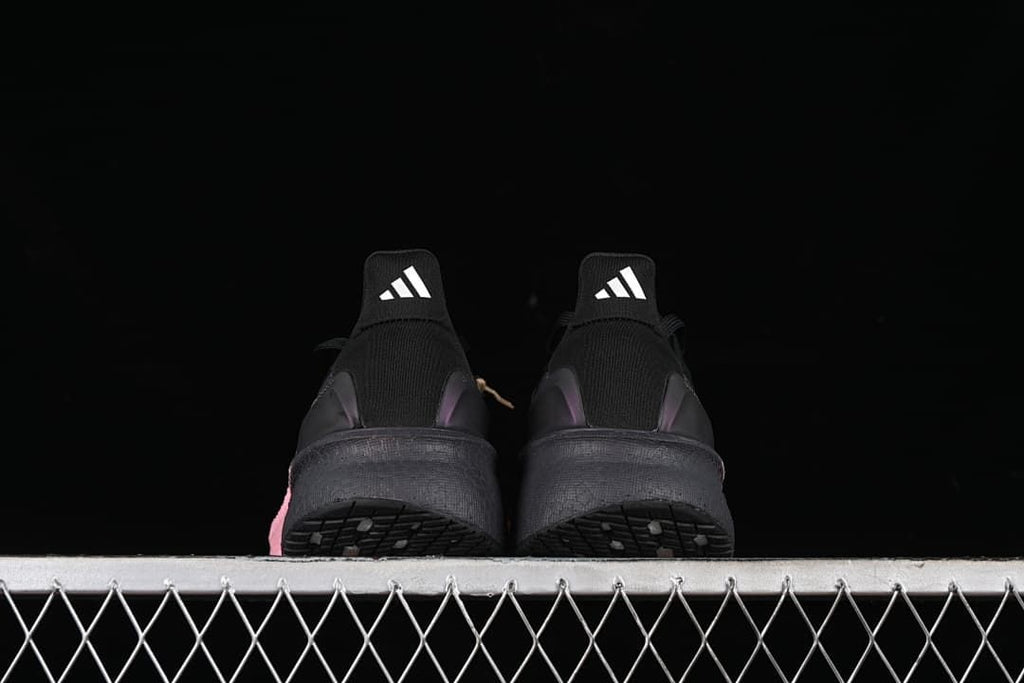 Rear view of both shoes and their heel details.