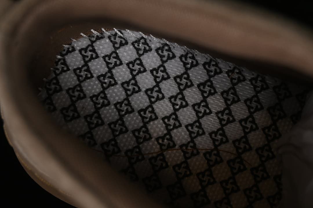 Close-up view inside the boot showing patterned lining