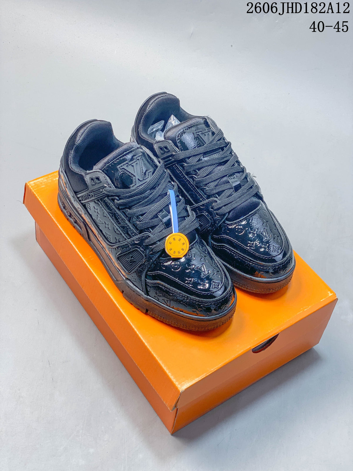 Black Louis Vuitton Trainer low-top sneakers on an orange box; image overlay reads 40–45.