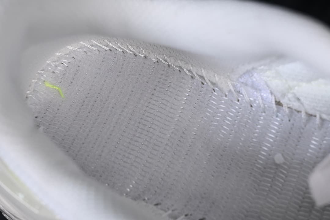 Close-up of the sneaker's interior lining and stitching.