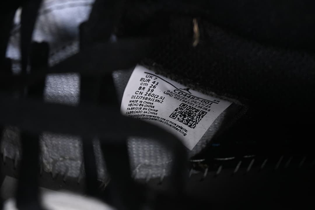 Inside shoe label showing EU 41 and style code CD4487-001