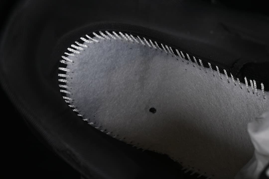 Close-up of the interior lining and stitching.