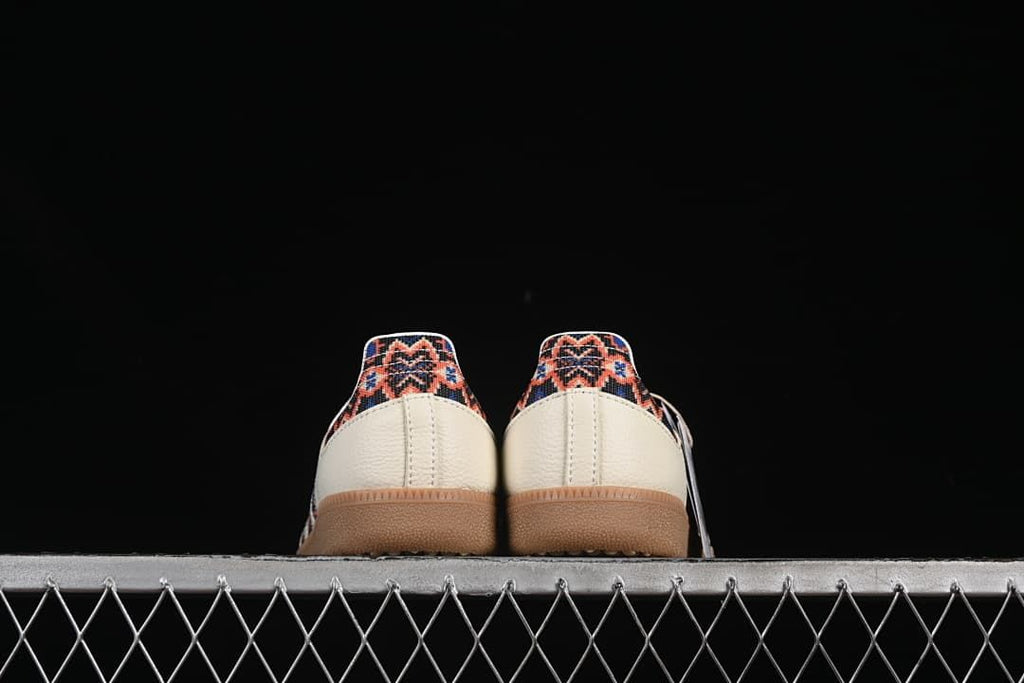 Rear view of both shoes showing patterned heel panels and gum soles