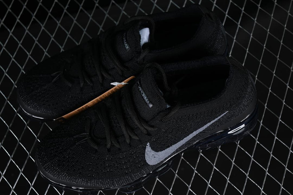 Pair of black VaporMax 2023 Flyknit sneakers viewed from above