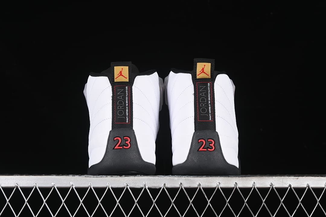 Rear view of the pair showing heel tabs and red number 23 details.
