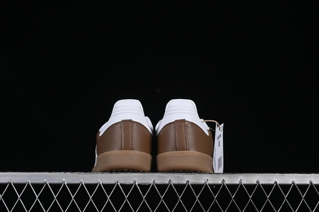 Rear view of the pair showing brown heel panels and white collars.