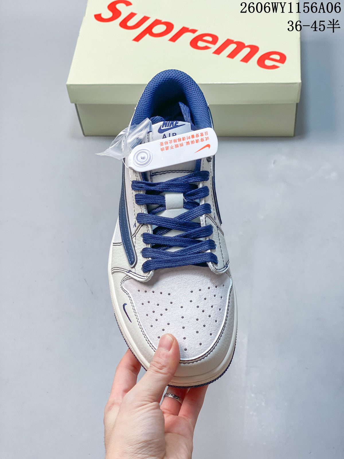 Top view showing perforated toe, blue laces, and blue collar lining