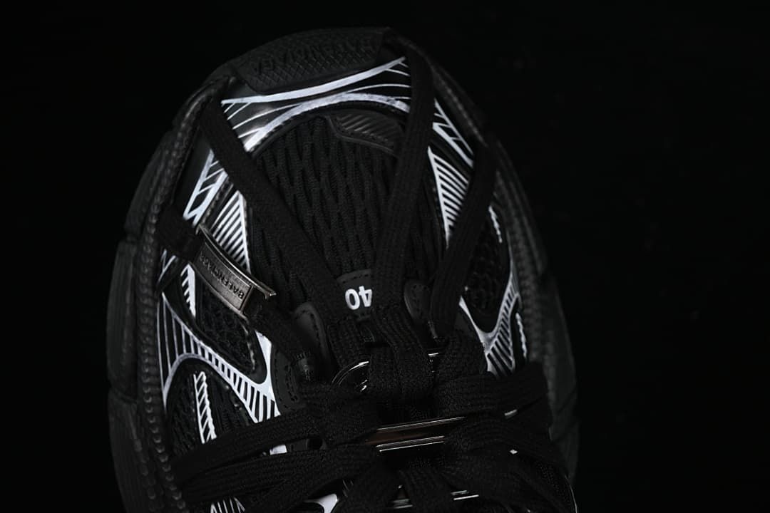 Top view of the sneaker showing the laces and patterned upper.
