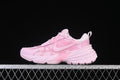 Side view of a pink Nike V2K Run sneaker with floral details