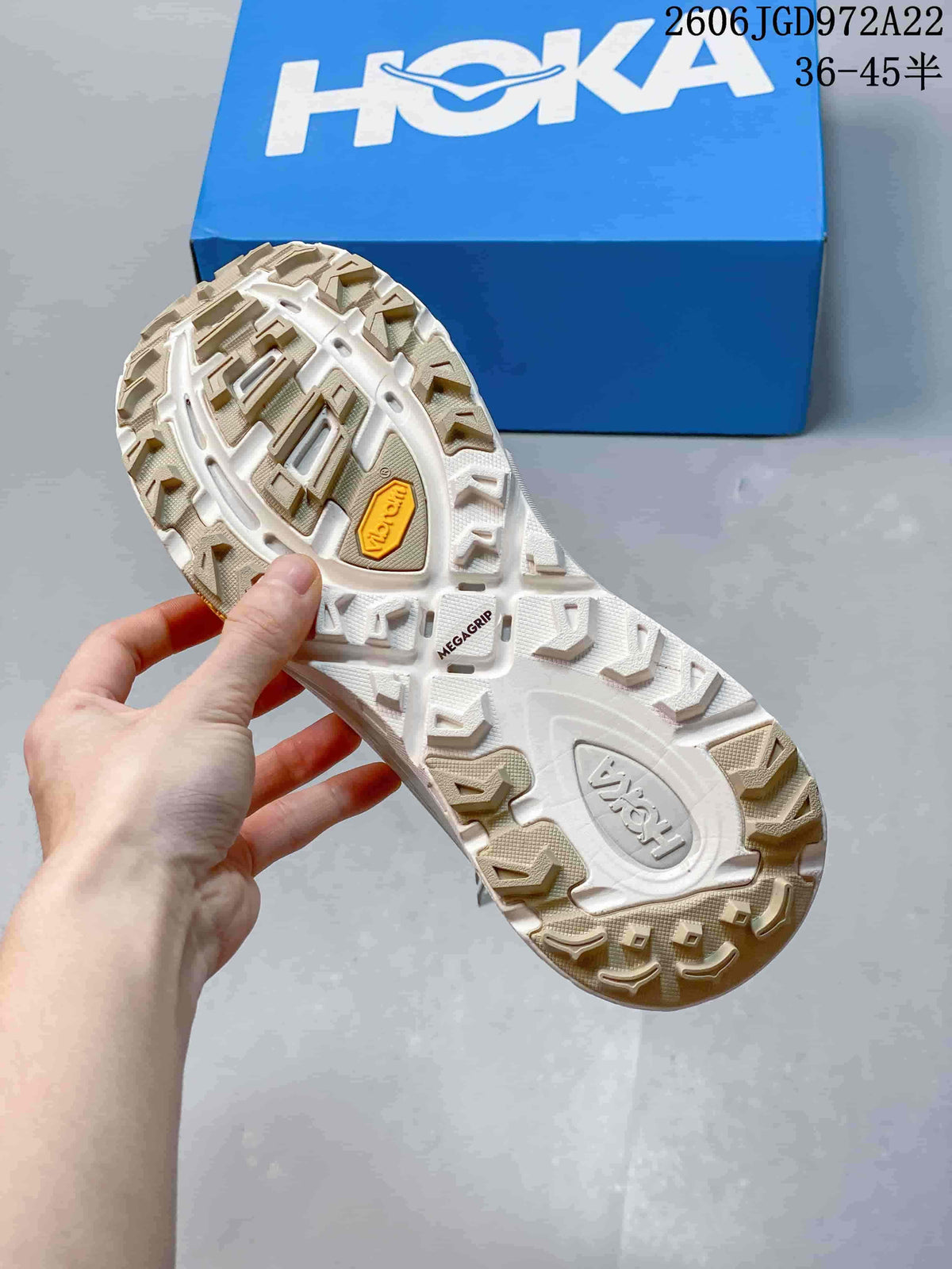 Close-up of the shoe outsole showing a rugged lugged tread pattern