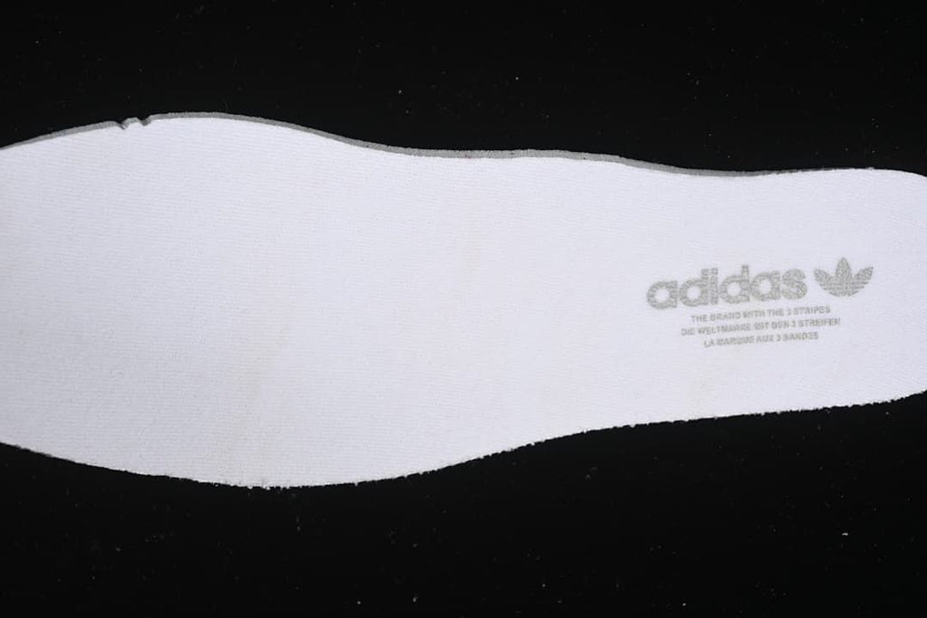 White adidas insole with Trefoil branding