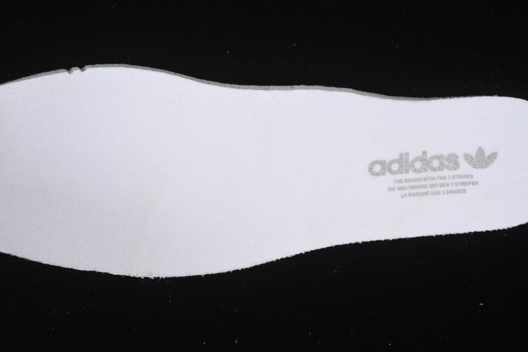 White adidas insole with Trefoil branding