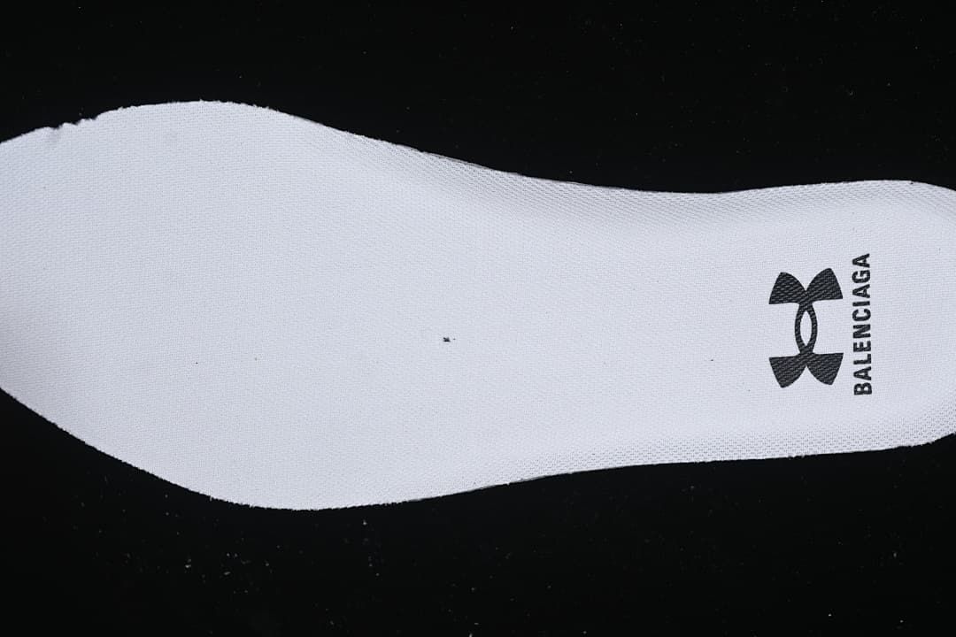 White insole with a black Balenciaga logo.