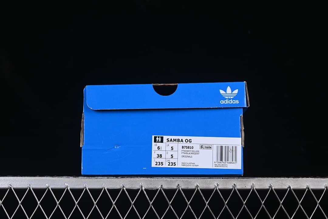 Blue adidas shoe box showing the Samba OG label and size information.