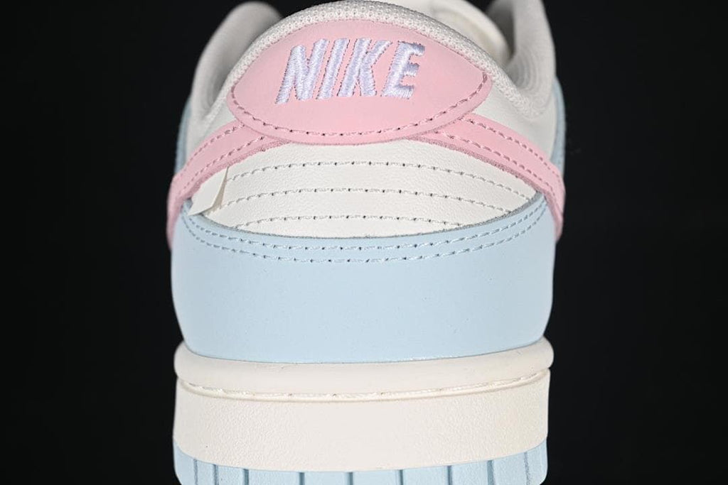Rear view showing pink heel tab and pale blue heel panel