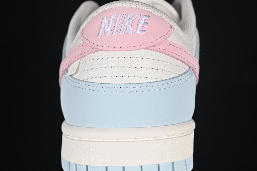 Rear view showing pink heel tab and pale blue heel panel
