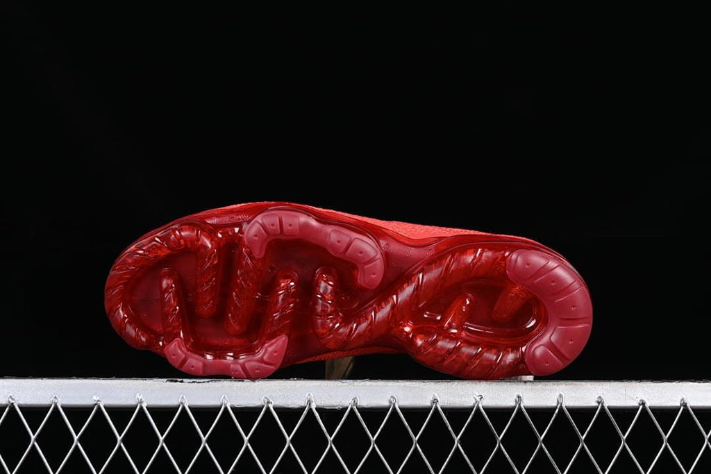 Underside view showing the translucent red sole pattern