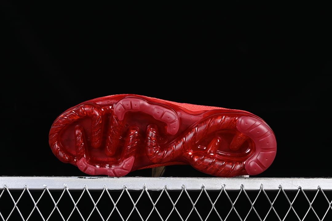 Underside view showing the translucent red sole pattern