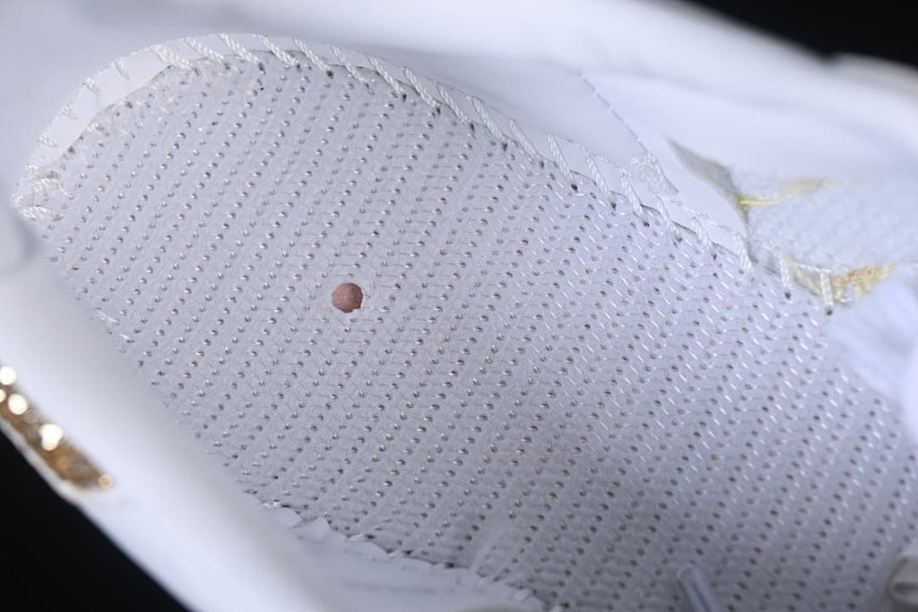 Close-up of the perforated inner surface of the sneaker