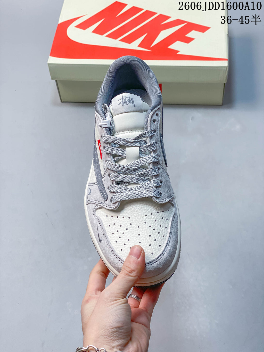 Top view showing the perforated toe, grey overlays, and patterned laces.