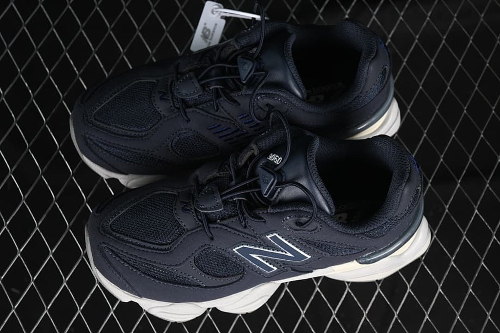 Pair of navy kids’ sneakers viewed from above