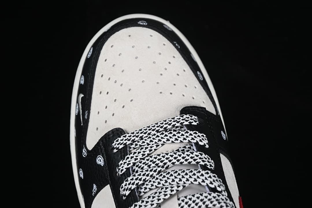 Top-down close-up of the perforated toe box and patterned laces.