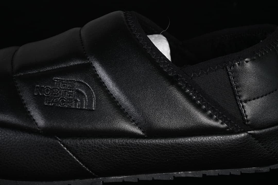Close-up of the quilted upper and side logo.