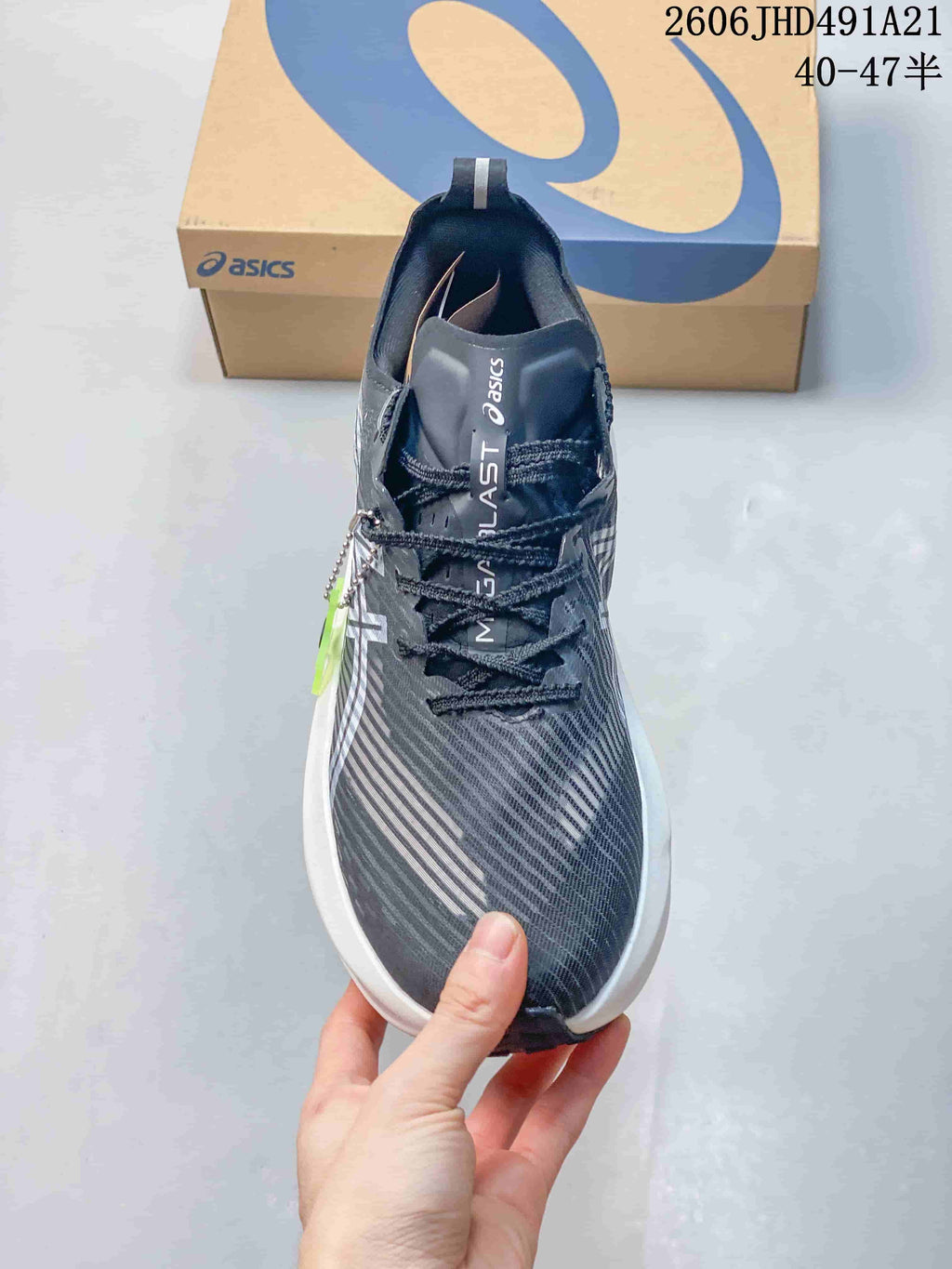 Top view of the shoe showing its laces, tongue, and patterned upper