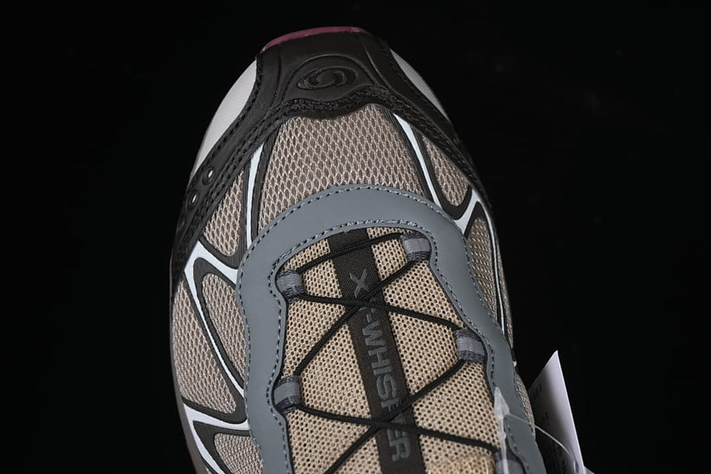 Top-down view of the shoe toe, upper, and lacing system.
