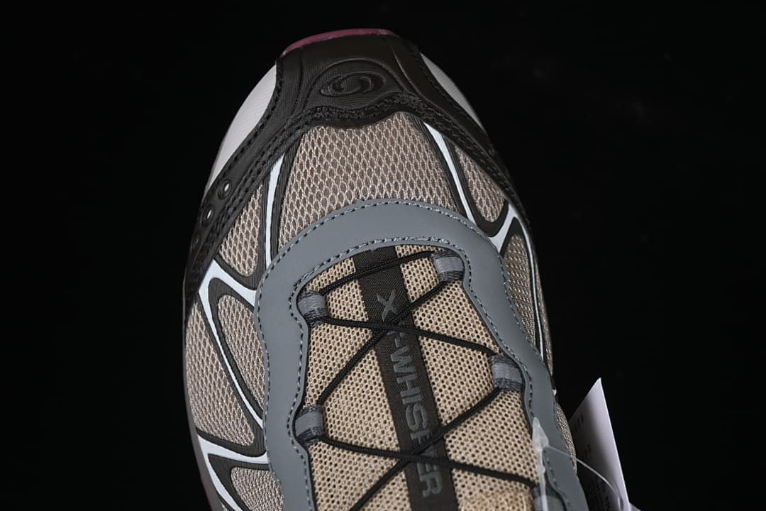 Top-down view of the shoe toe, upper, and lacing system.