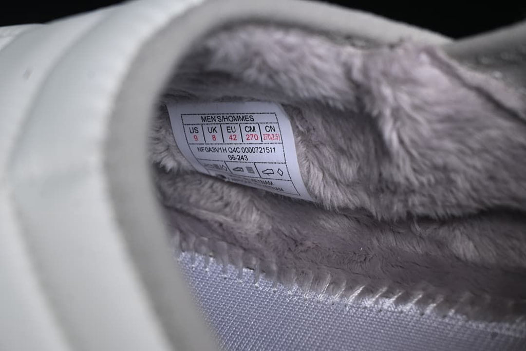 Interior size label visible among the plush lining.
