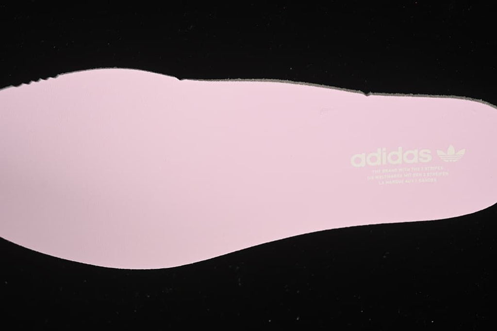 Pink insole with adidas branding