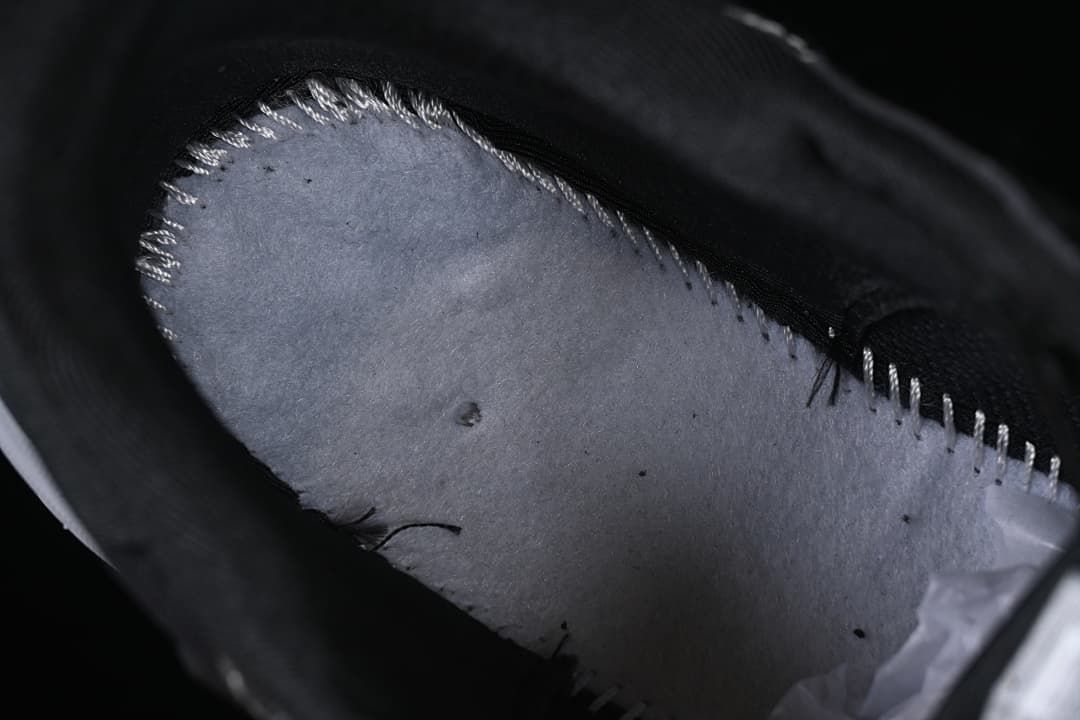 Close-up inside the shoe showing the footbed and interior construction