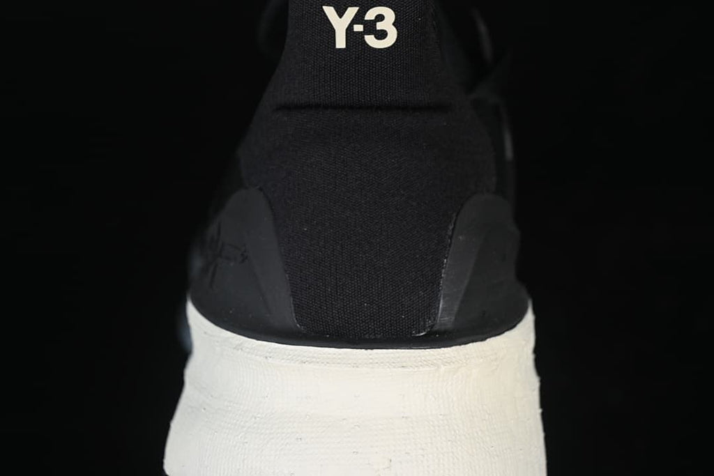 Rear view showing the Y-3 heel branding and contrasting midsole