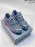 Dark gray and off-white Kolon Sport low-top shoes shown together